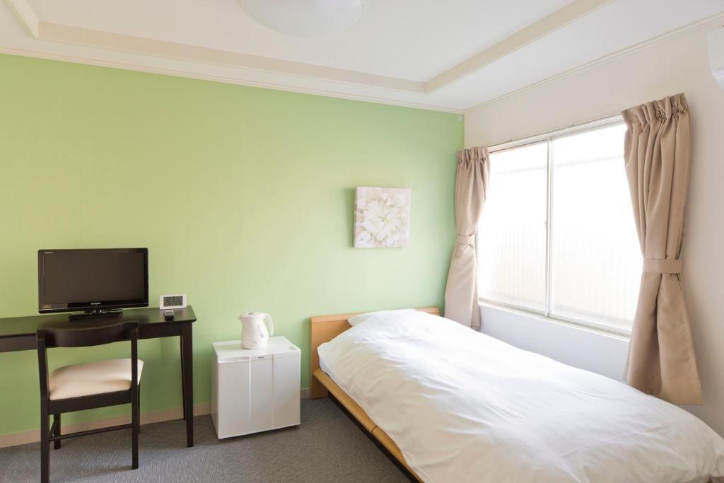 Shin-Okubo City Hotel Токио Номер фото